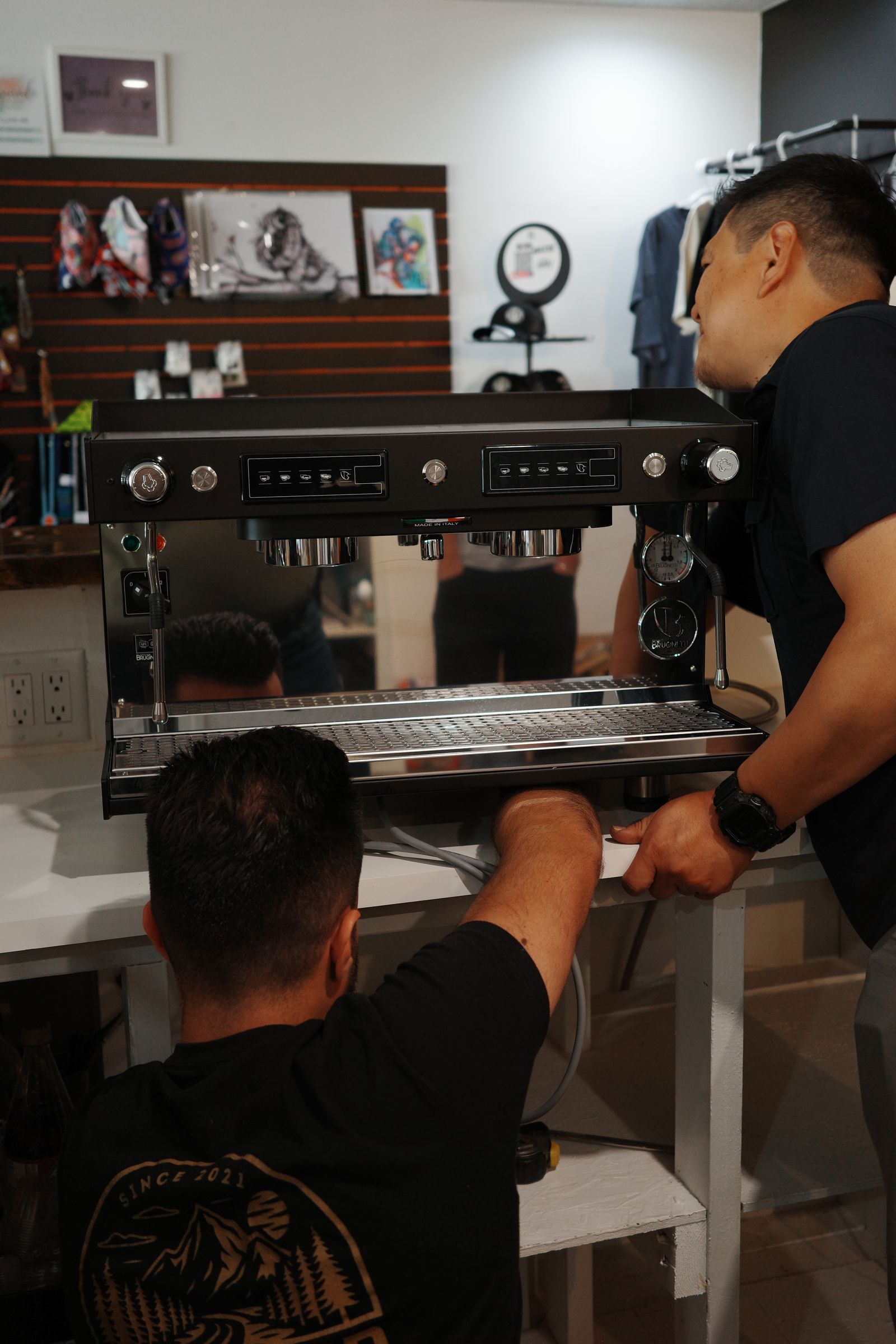 Installing an espresso machine on a cafe counter