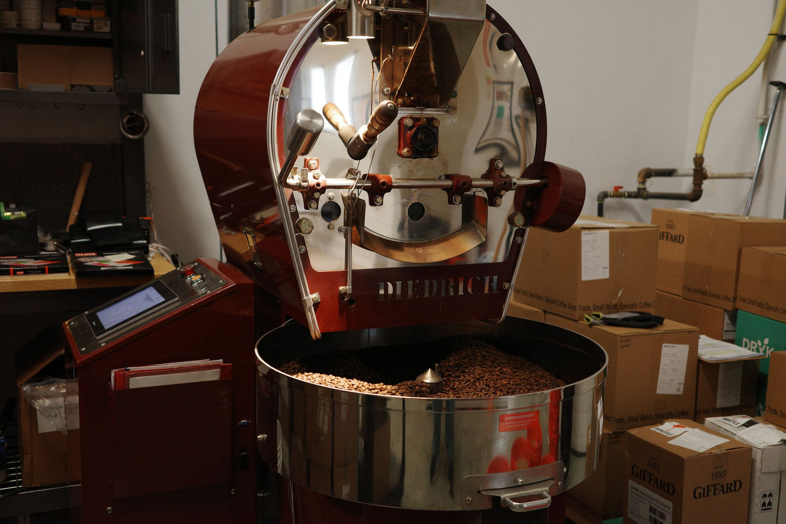 Fresh coffee turning in the cooling tray of the roaster